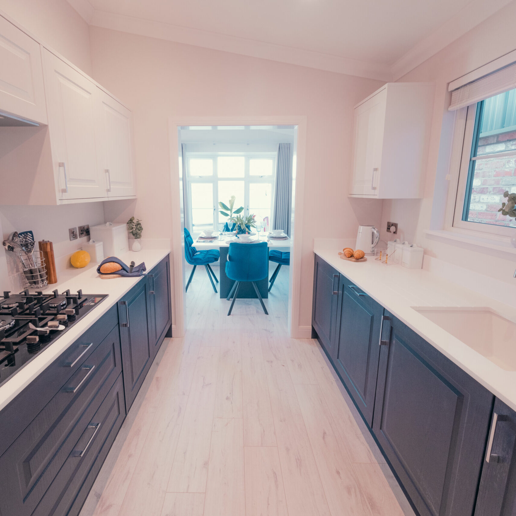 Kitchen with dining area in background Warkton Platinum